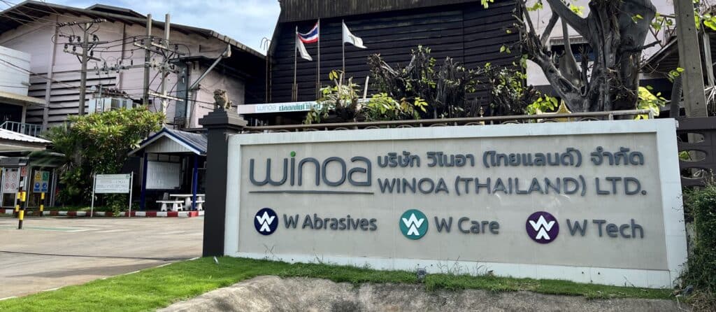 Winoa Thailand office sign with W Abrasives branding